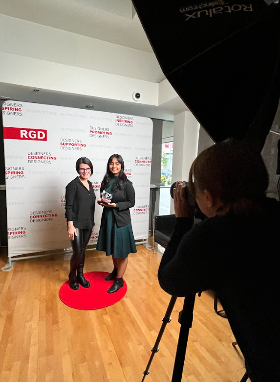 Communications team accepts the RGD award