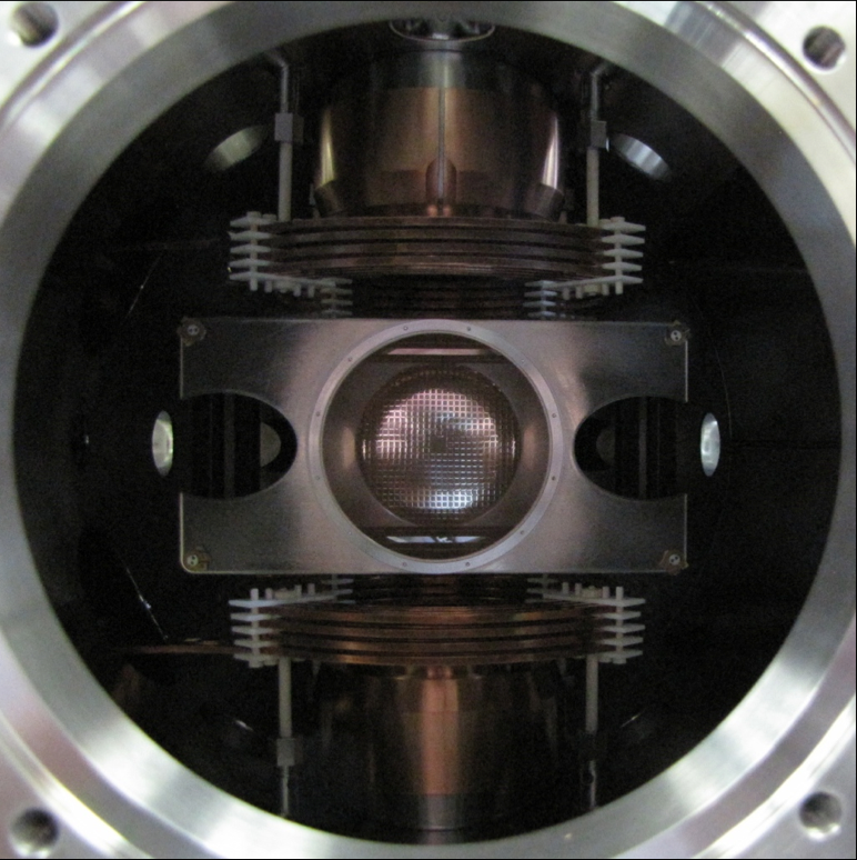 A small symmetrical chamber used in TRINAT